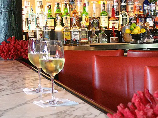 Bar interior with wine and spirits at Sea Watch on the Ocean